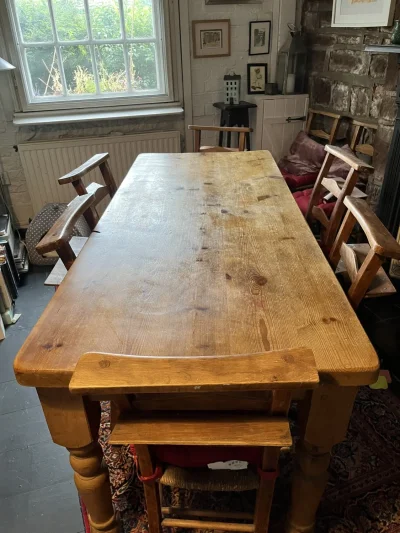 Vintage farmhouse pine dining table with turned legs and plank-style top — image 2