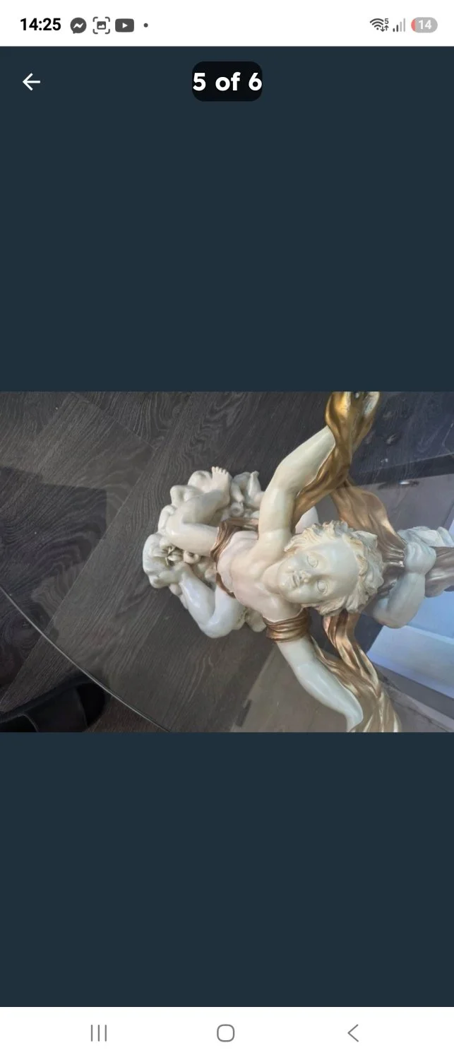 Vintage-style sculptural cherub centre table with round glass top