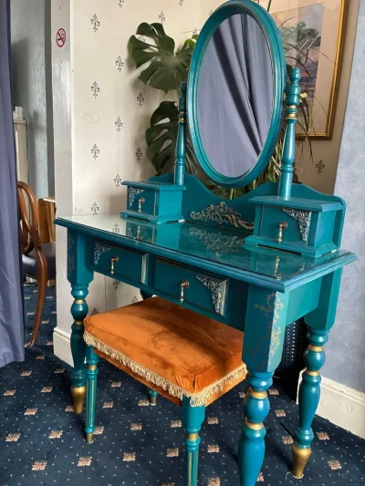 Teal painted vintage pine dressing table with oval mirror and fringed stool on Furnish Well